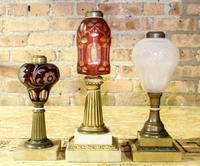 Three Glass Fluid Lamps. Height of tallest 14 inches.