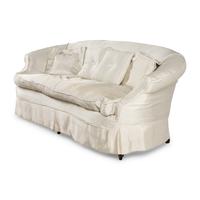 A Cream Silk-Slipcovered Reniform Sofa