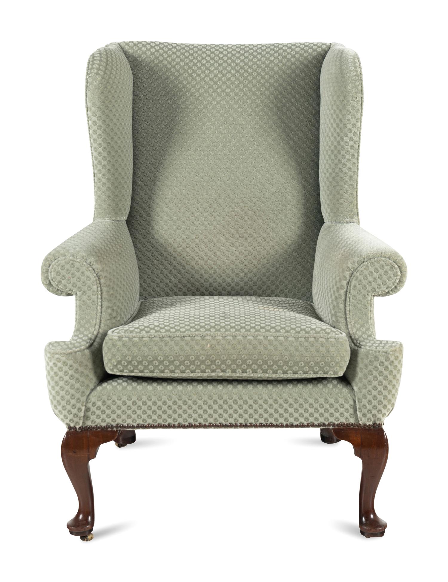 A Queen Anne Walnut Wingback Armchair