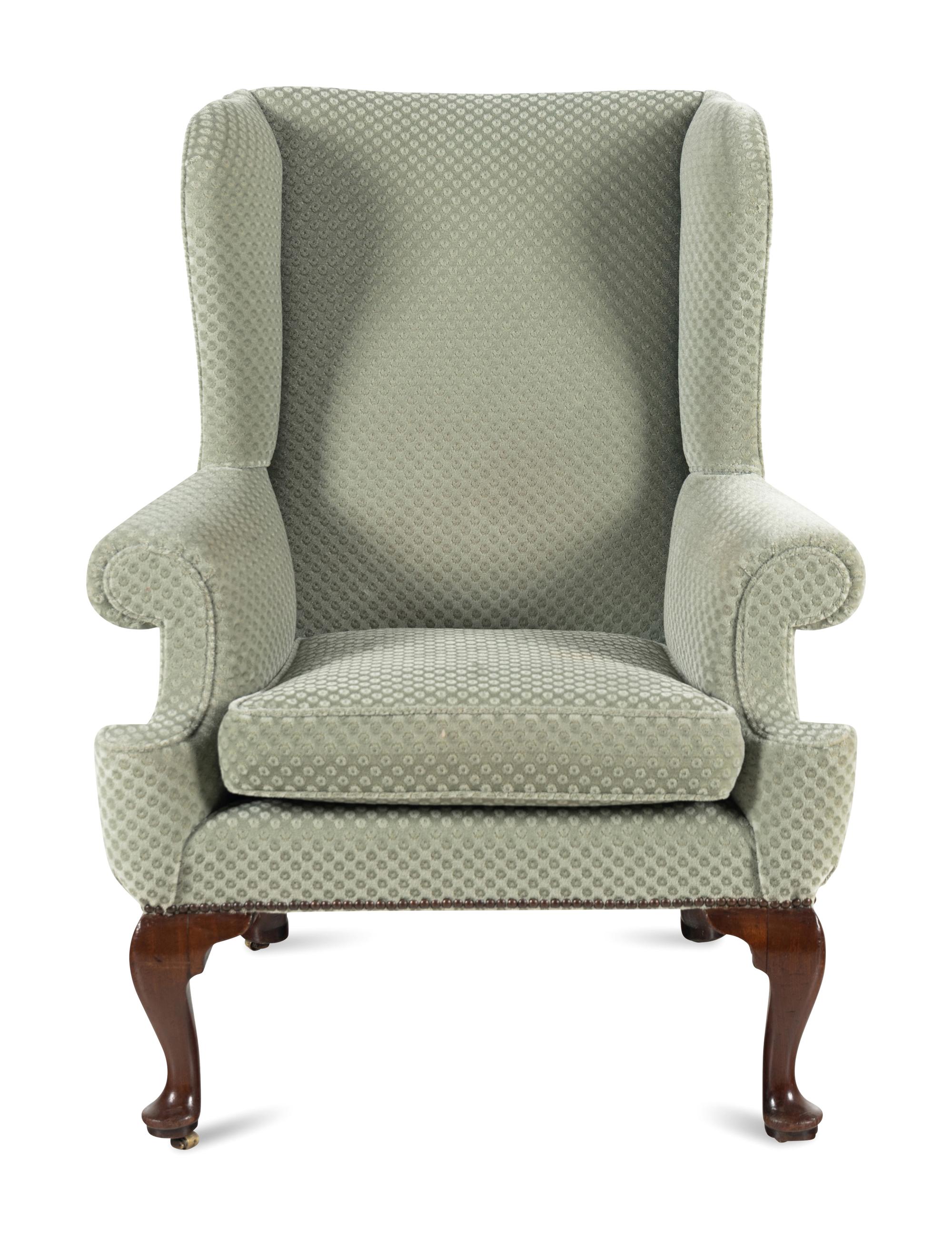 A Queen Anne Walnut Wingback Armchair