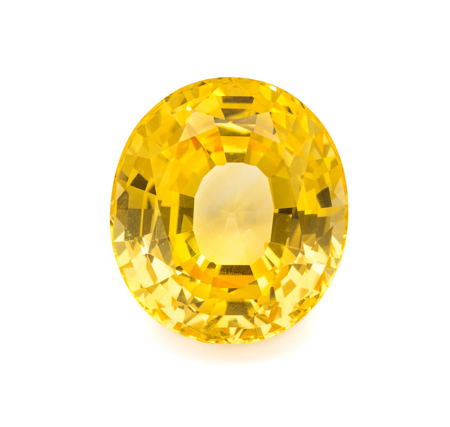 A 21.39 Carat Oval Mixed Cut Unheated Ceylon Yellow Sapphire, 3.90 dwts.