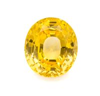 A 21.39 Carat Oval Mixed Cut Unheated Ceylon Yellow Sapphire, 3.90 dwts.