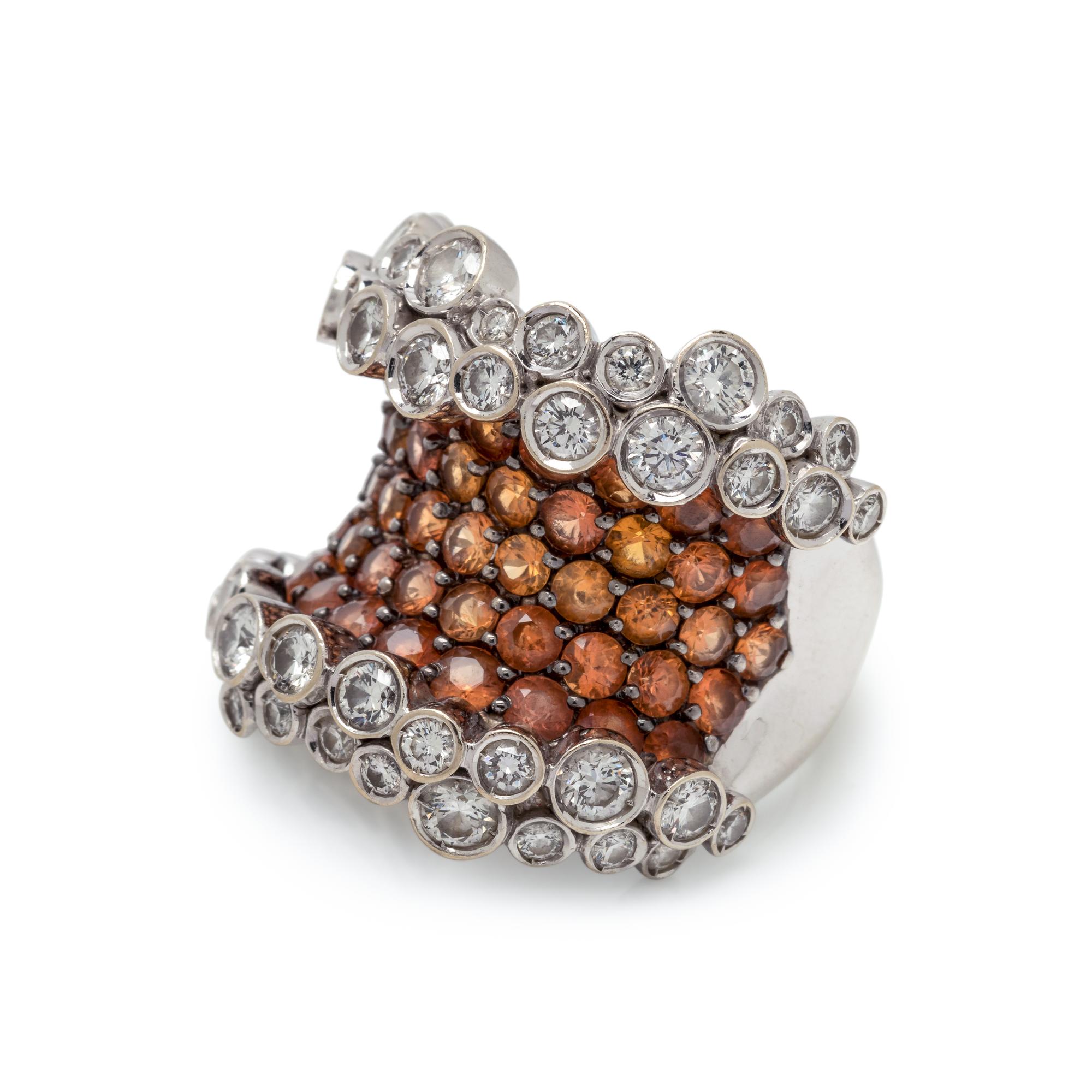 STEFAN HEFNER, DIAMOND AND ORANGE SAPPHIRE 'CORSET' RING