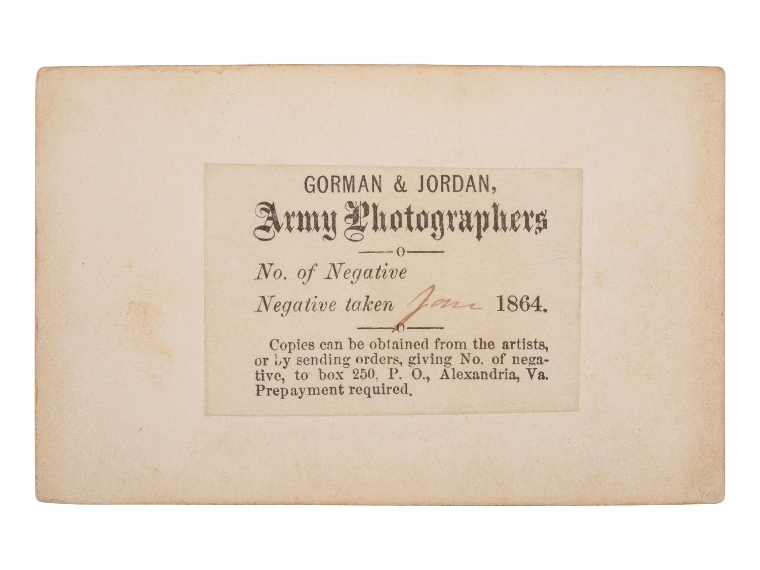 [CIVIL WAR]. CDV of a photographer's tent reading "AMBROTYPES," with the likely photographer and an officer standing just outside. Alexandria, VA: Gorman & Jordan, ca 1864.