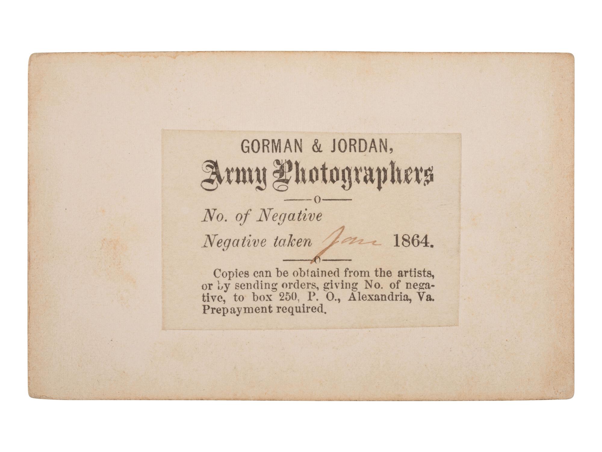 [CIVIL WAR]. CDV of a photographer's tent reading "AMBROTYPES," with the likely photographer and an officer standing just outside. Alexandria, VA: Gorman & Jordan, ca 1864.
