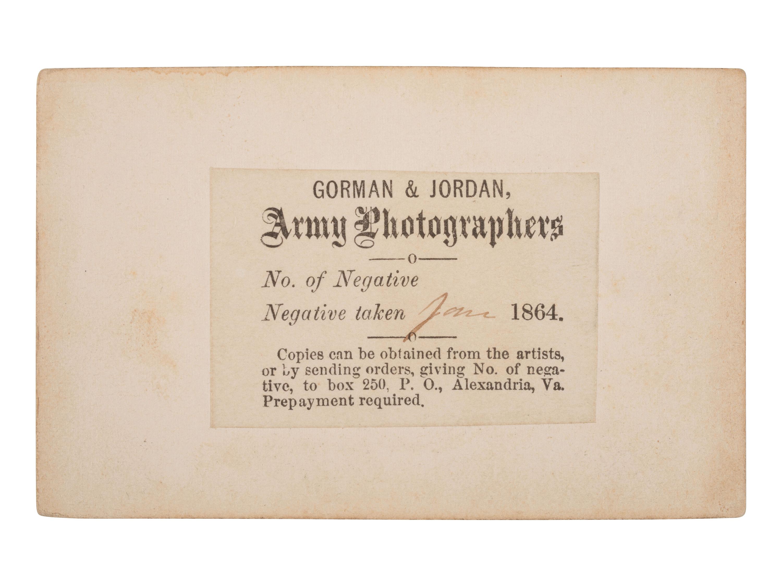 [CIVIL WAR]. CDV of a photographer's tent reading "AMBROTYPES," with the likely photographer and an officer standing just outside. Alexandria, VA: Gorman & Jordan, ca 1864.