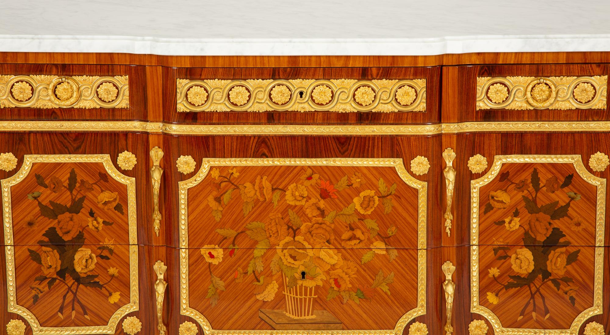 A Pair of Louis XV/XVI Transitional Style Gilt Bronze Mounted Marquetry Marble-Top Commodes