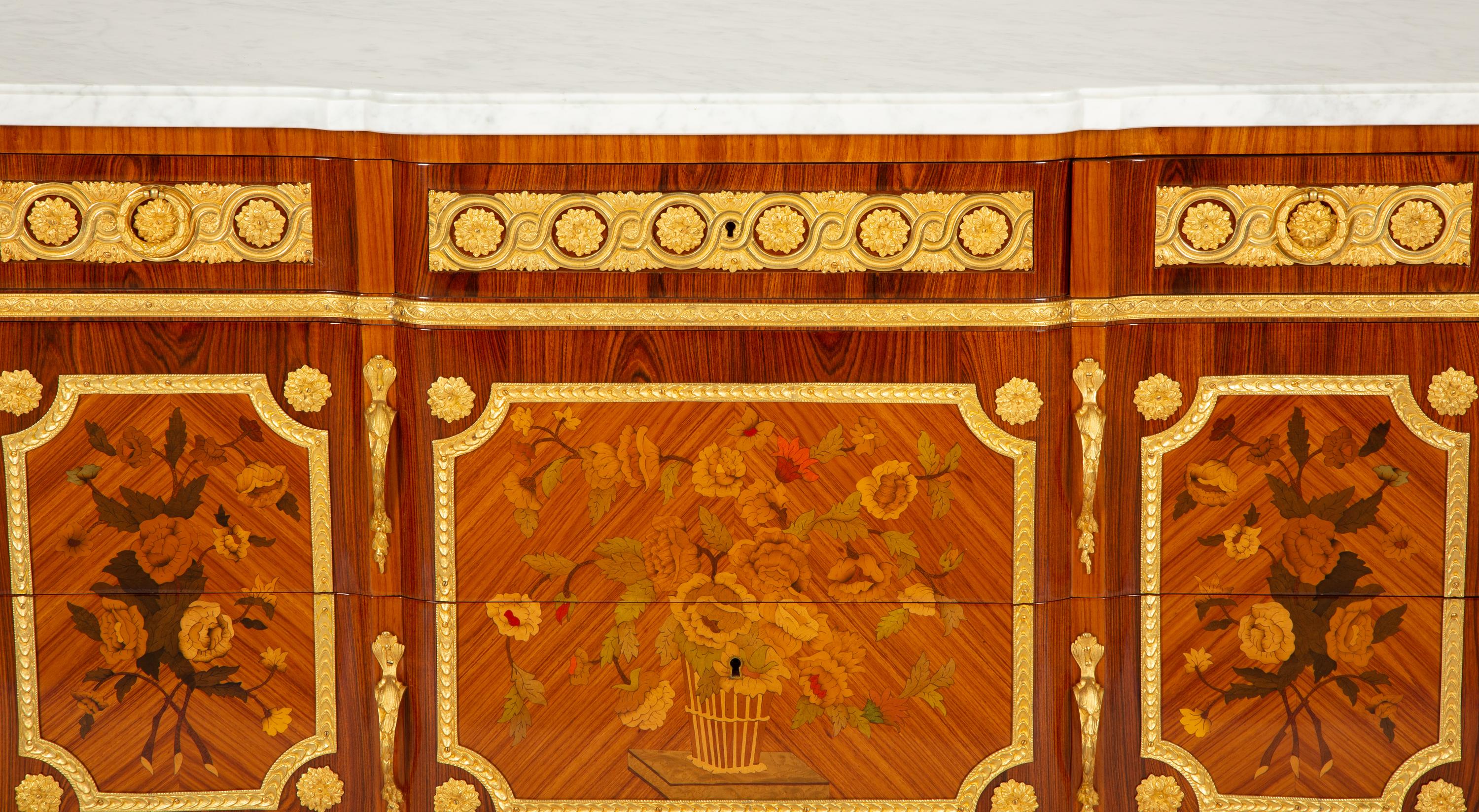A Pair of Louis XV/XVI Transitional Style Gilt Bronze Mounted Marquetry Marble-Top Commodes