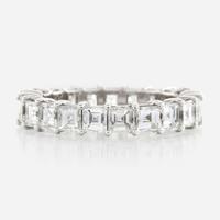 A diamond and white gold eternity band