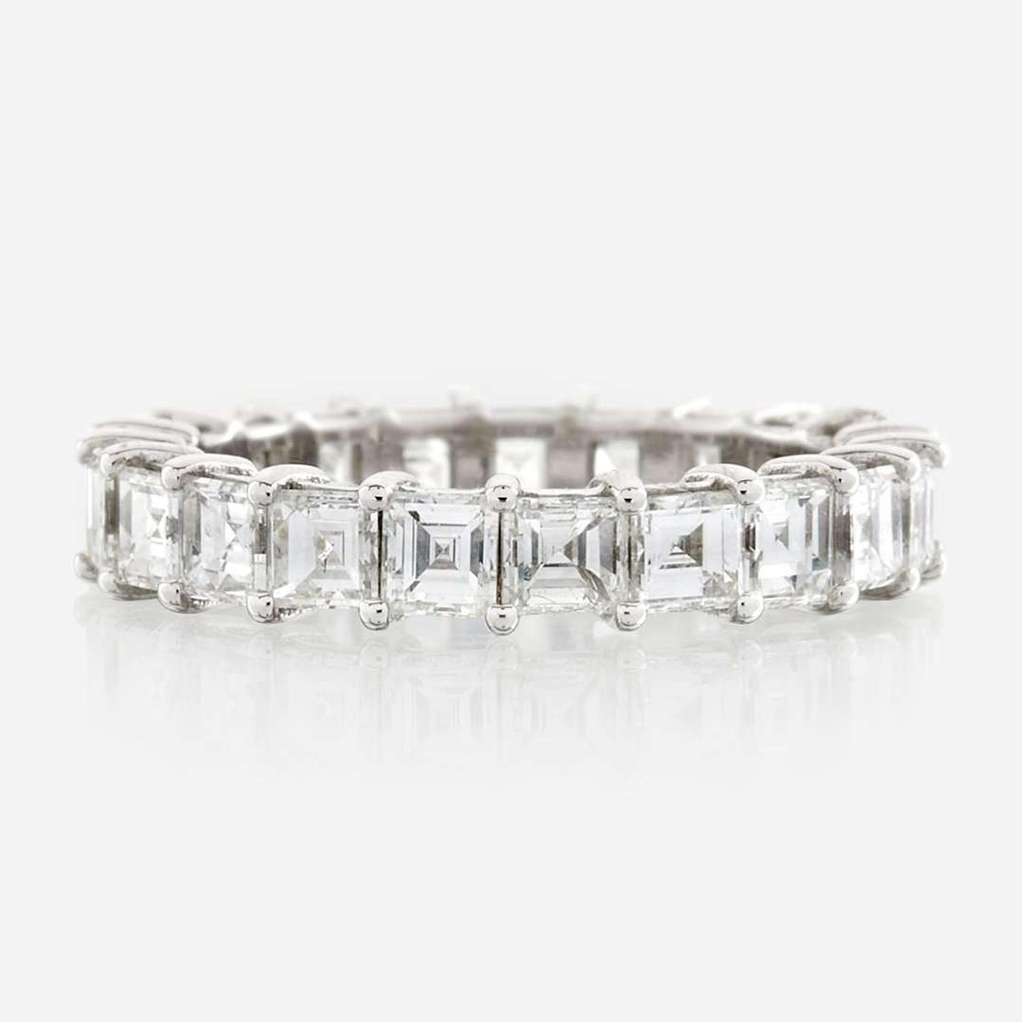 A diamond and white gold eternity band