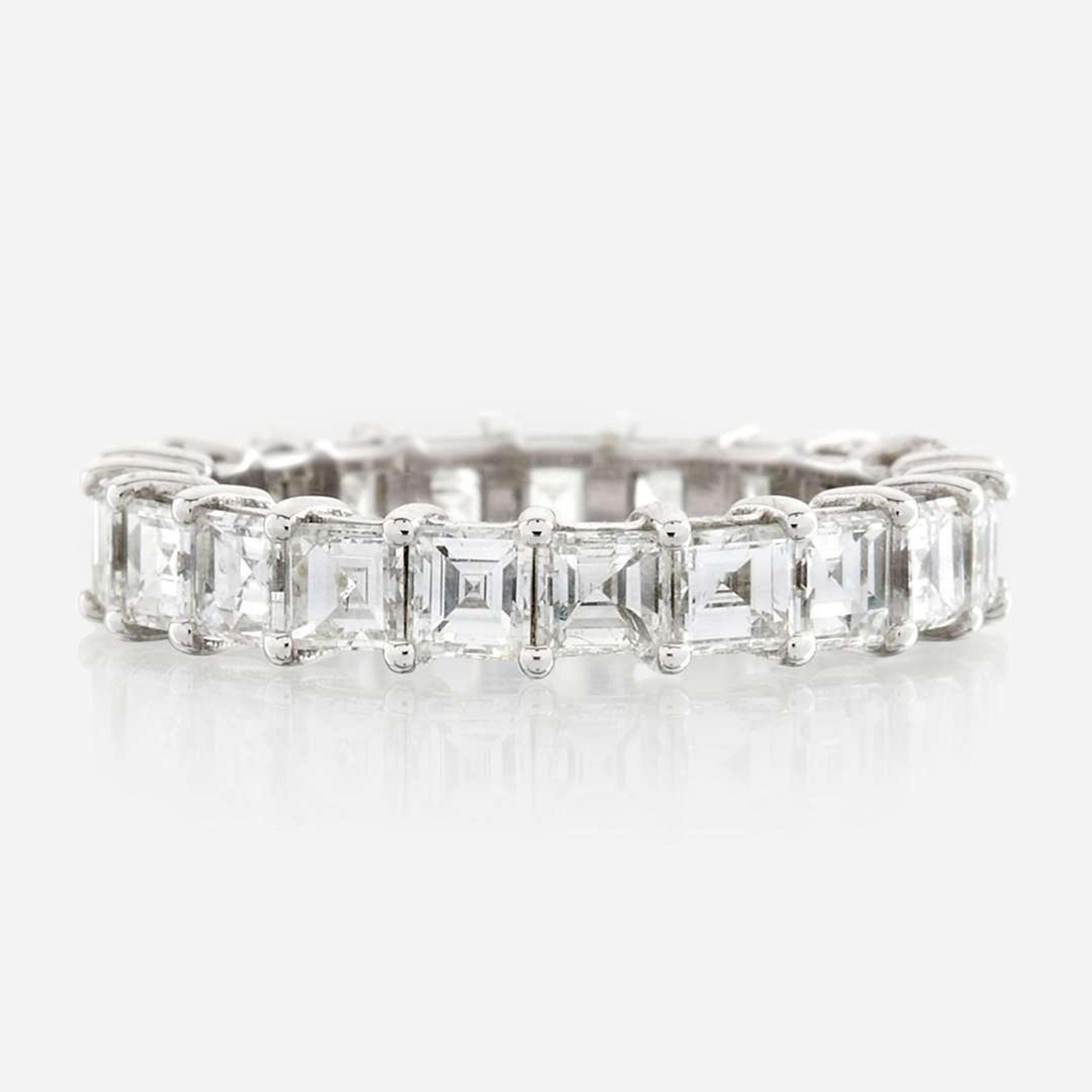 A diamond and white gold eternity band