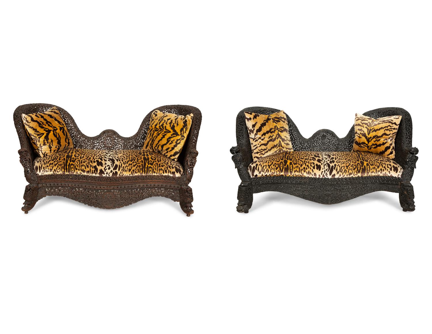 Two Similar Anglo-Burmese Carved Teak Settees