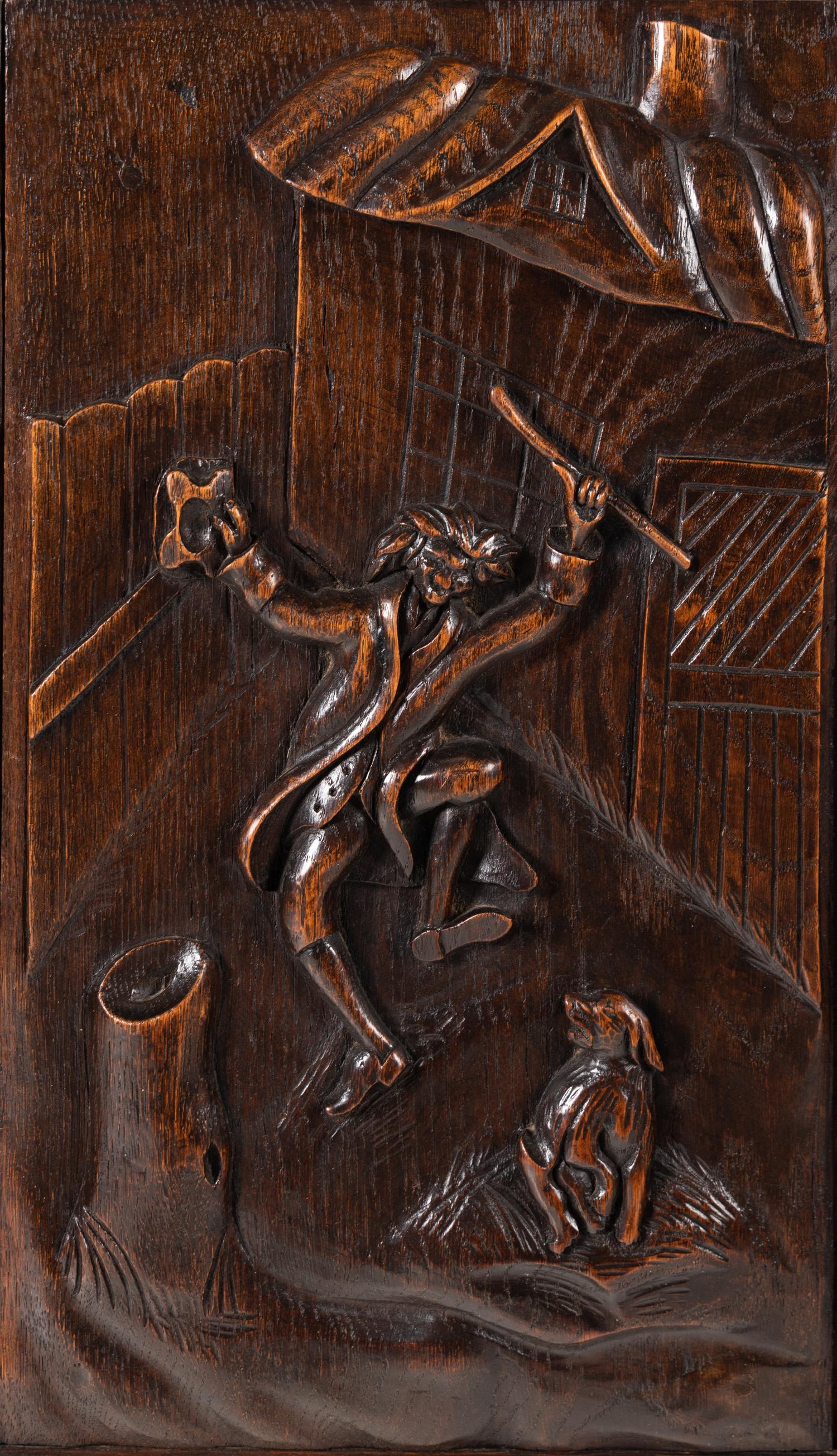 A Continental Carved Oak Wardrobe Cabinet