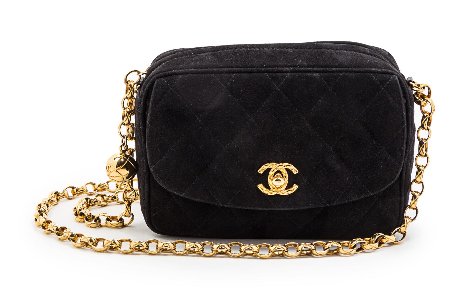 A Chanel Black Quilted Suede Bag, 6 1/2 x 4 1/2 x 2 1/2 inches.
