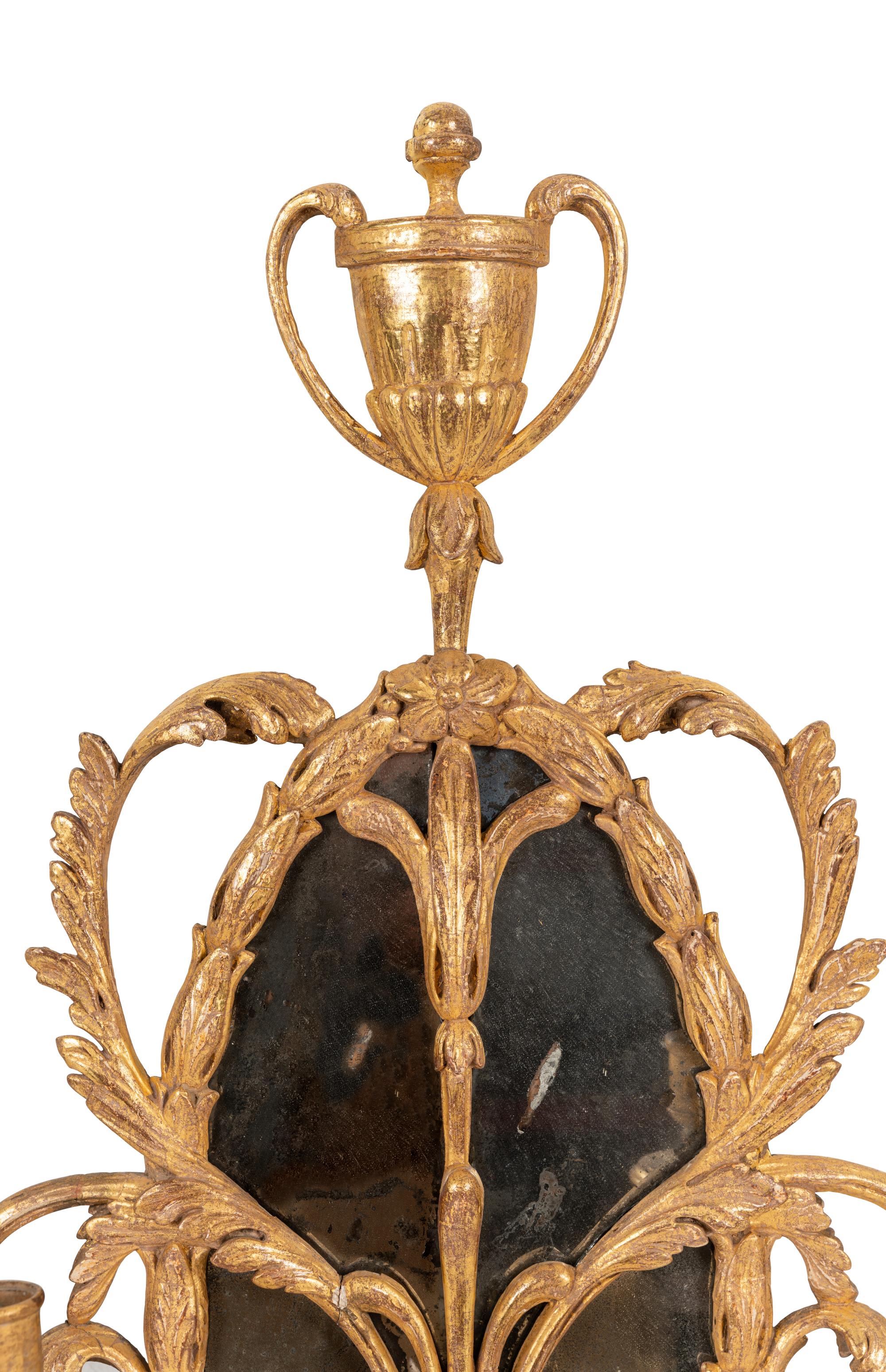 A Pair of George III Giltwood Girandole Mirrors