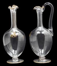 A Pair of Le Rosey Glass Carafes Height 10 1/2 inches.