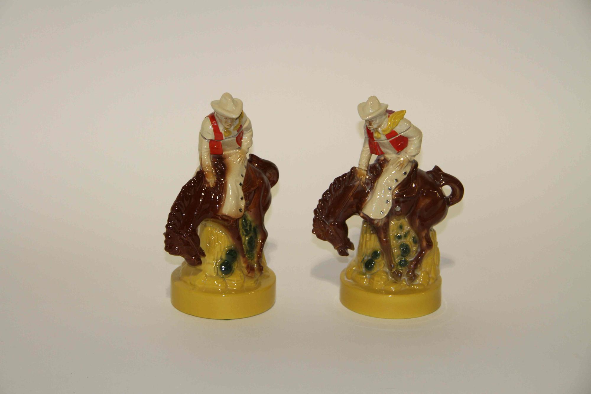 A Pair of Haeger Pottery Figural Groups Height 10 inches.