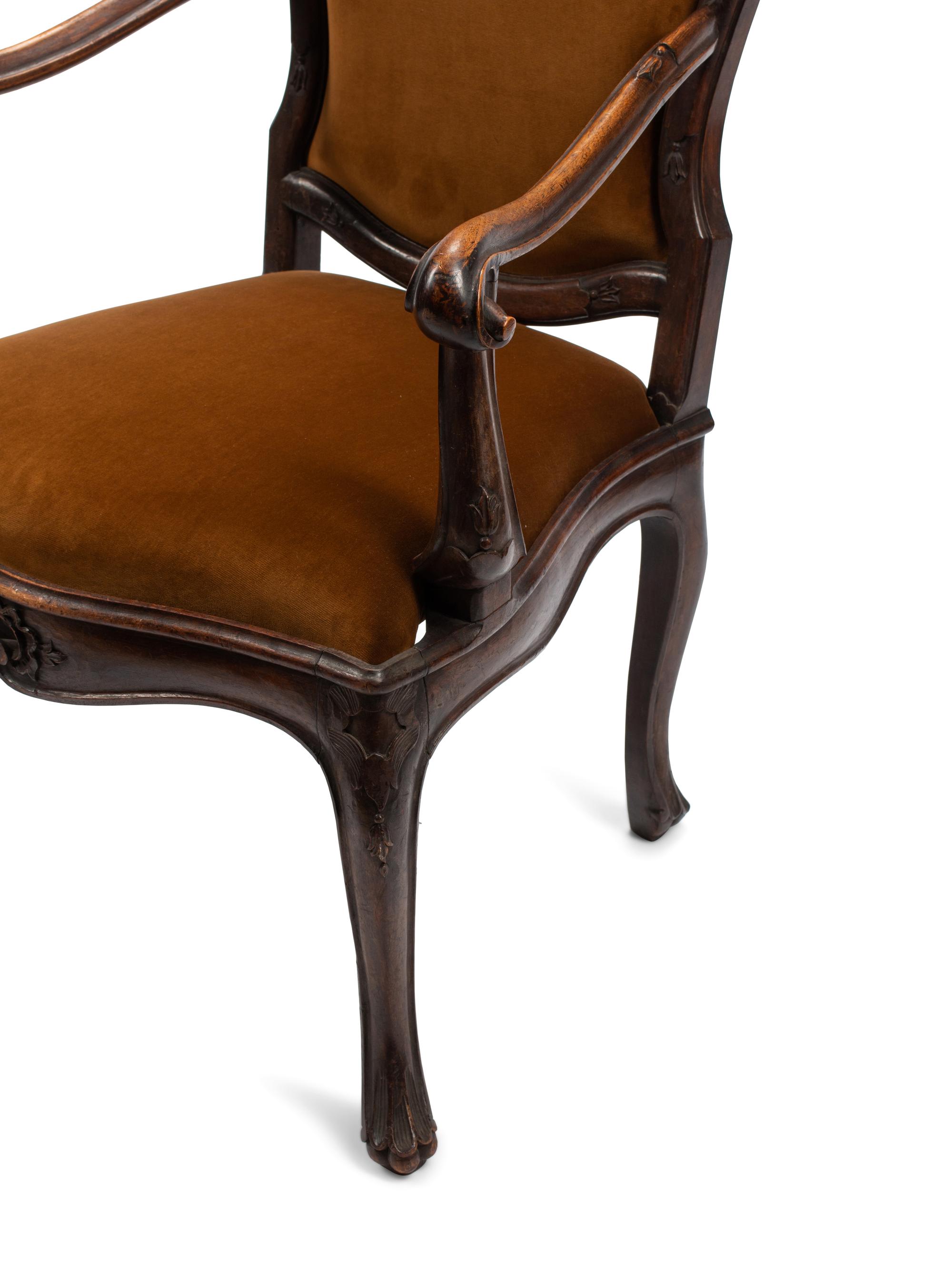 A Pair of Venetian Carved Walnut Armchairs