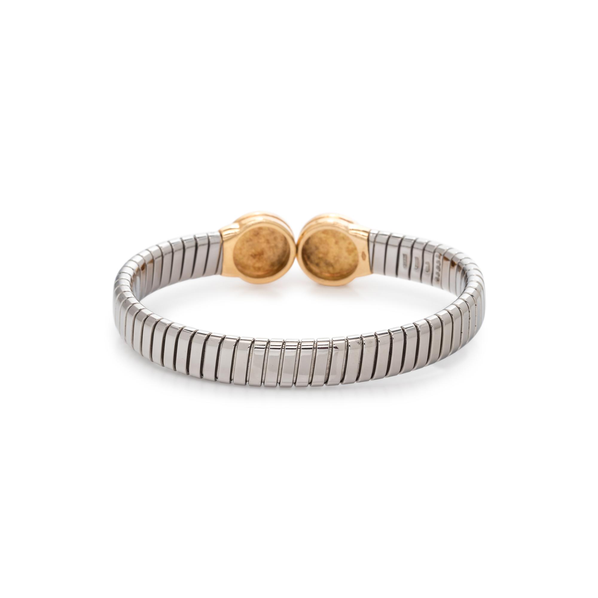 BVLGARI, STEEL, YELLOW GOLD AND ONYX 'TUBOGAS' CUFF BRACELET