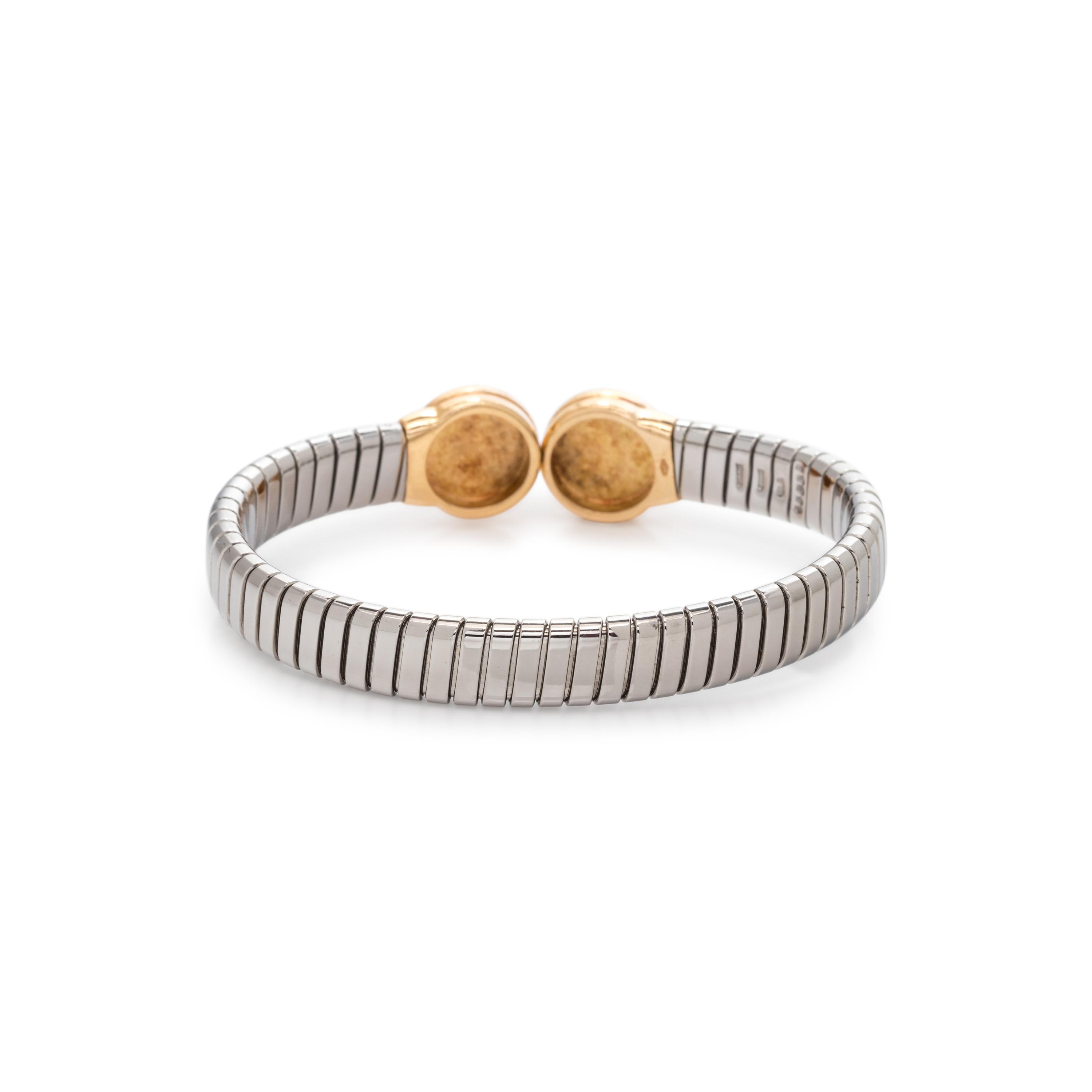 BVLGARI, STEEL, YELLOW GOLD AND ONYX 'TUBOGAS' CUFF BRACELET