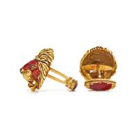 YELLOW GOLD, ENAMEL, AND EMERALD LION CUFFLINKS