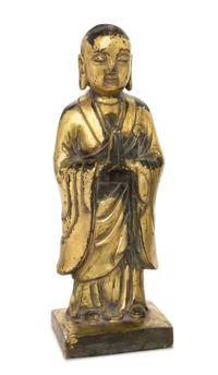 A Gilt Bronze Figure of a Standing Buddha Height 8 3/4 inches. — 19TH CENTURY