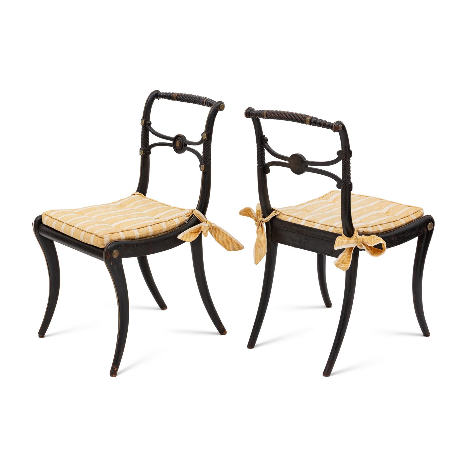 A Suite of Six Regency Ebonized and Caned Dining Chairs