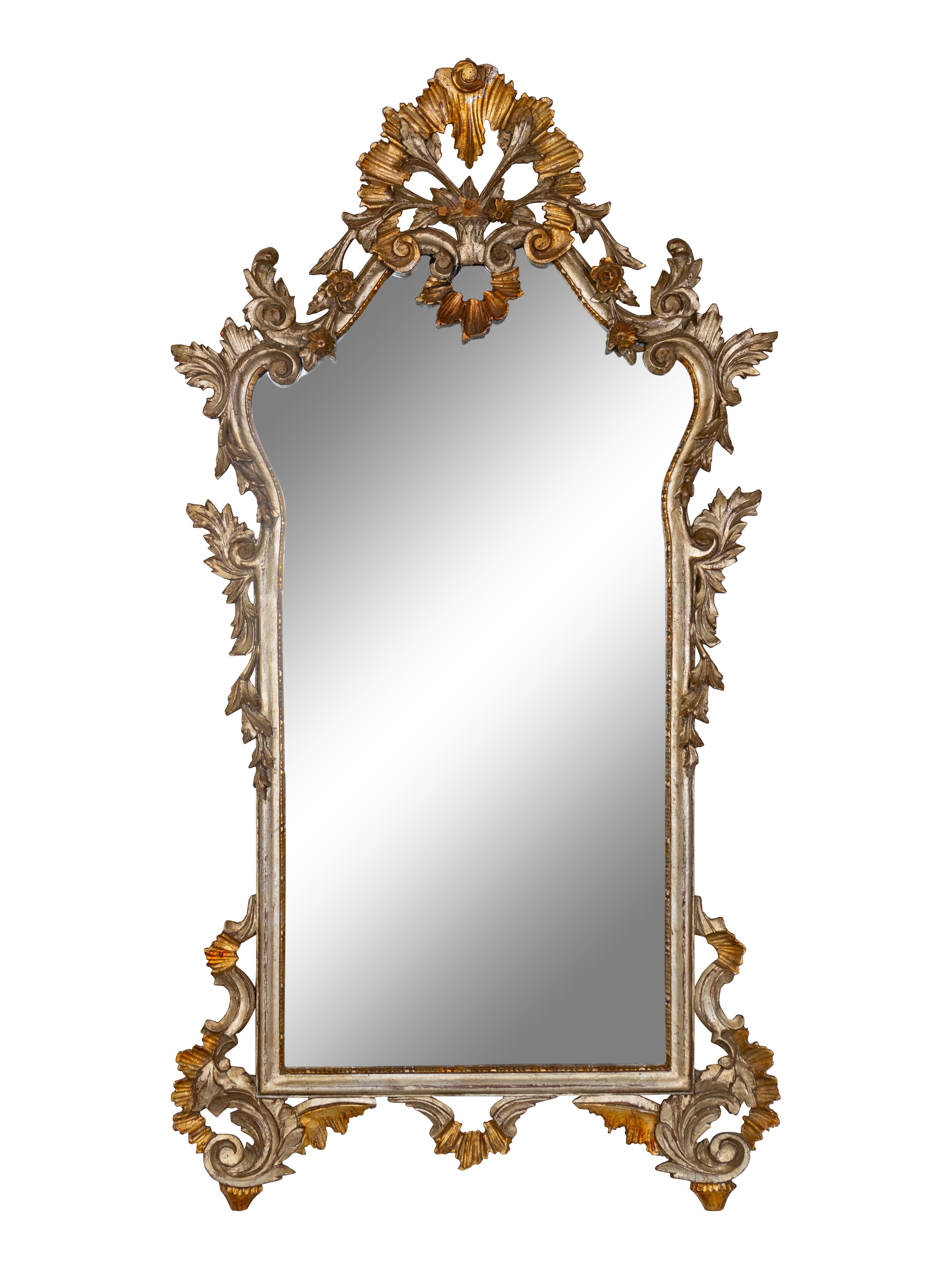 An Italian Baroque Style Giltwood Mirror