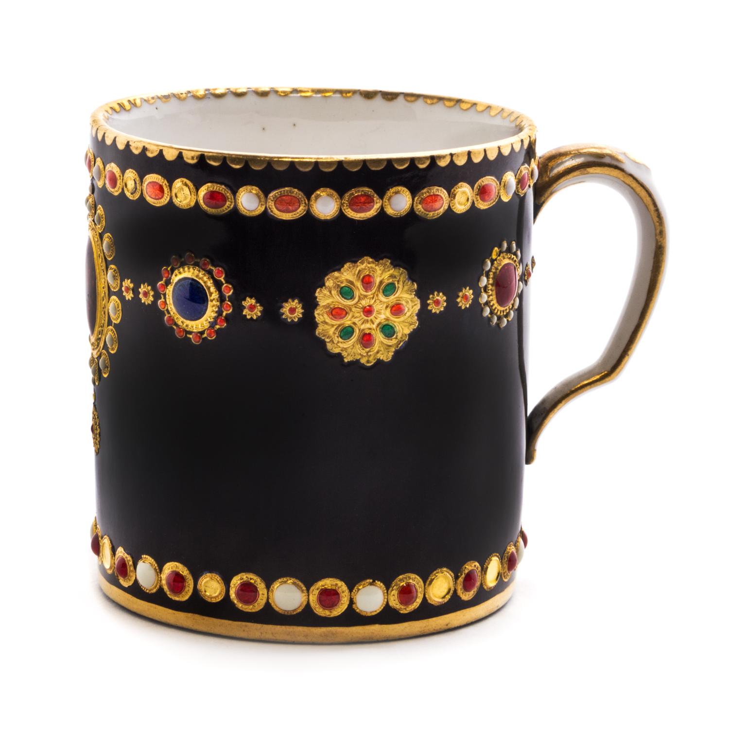 A Sevres Jeweled Porcelain Cup Height 2 3/8 inches. — CIRCA 1786