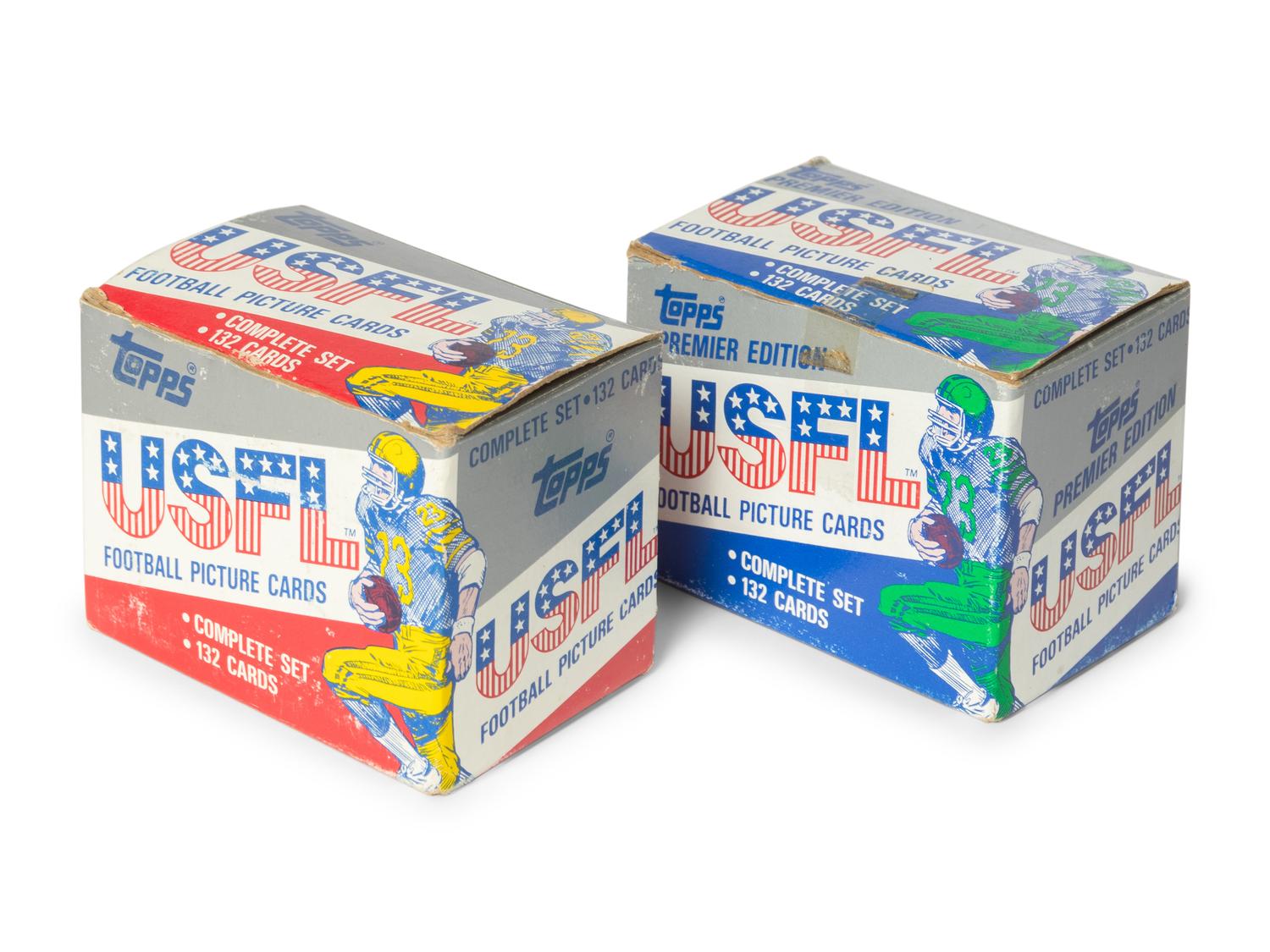 A Group of 1984 and 1985 Topps USFL Complete Sets In Factory Issued Boxes