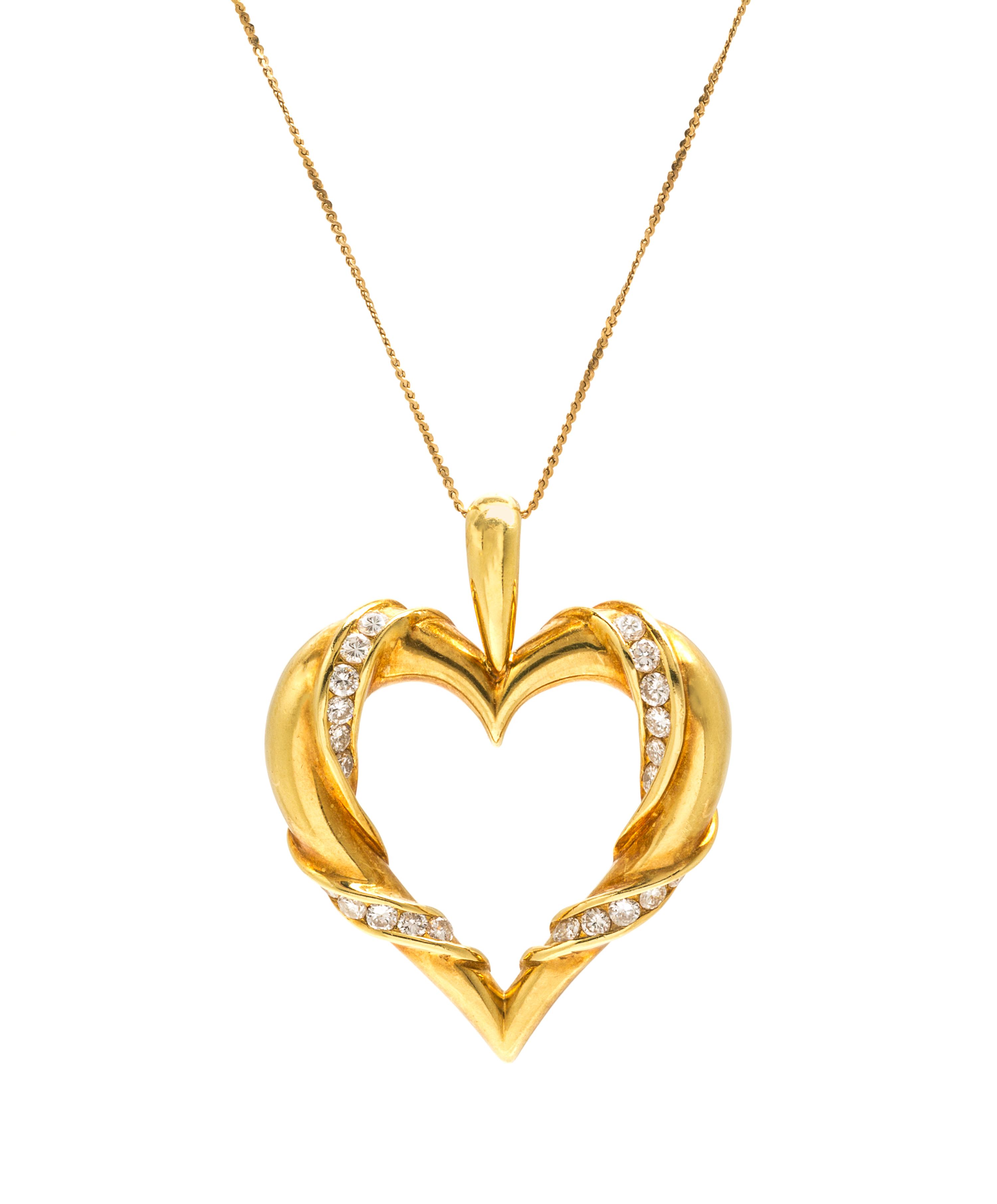 An 18 Karat Yellow Gold and Diamond Heart Pendant, Jose Hess, 8.60 dwts.