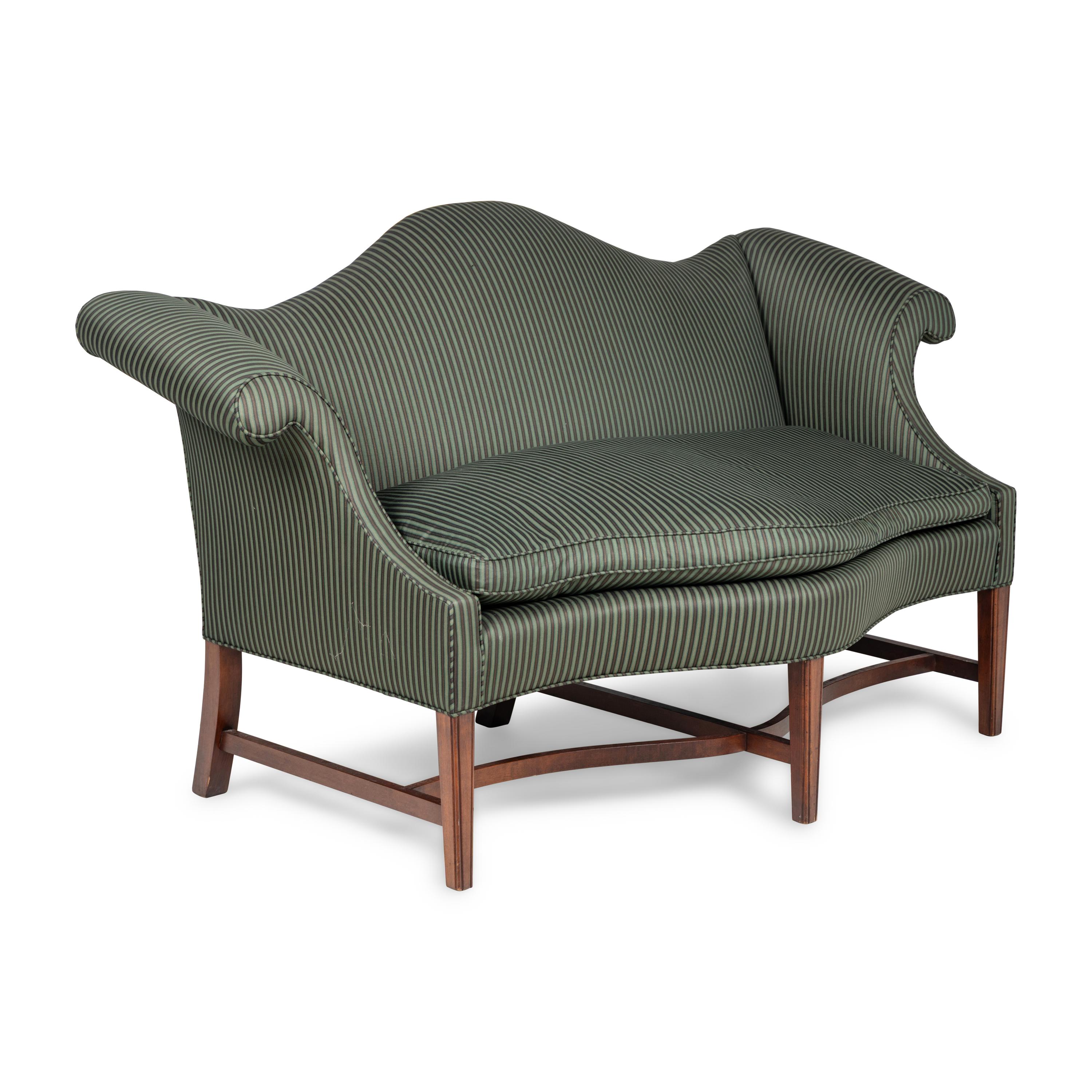 A George III Style Mahogany Camelback Serpentine Sofa