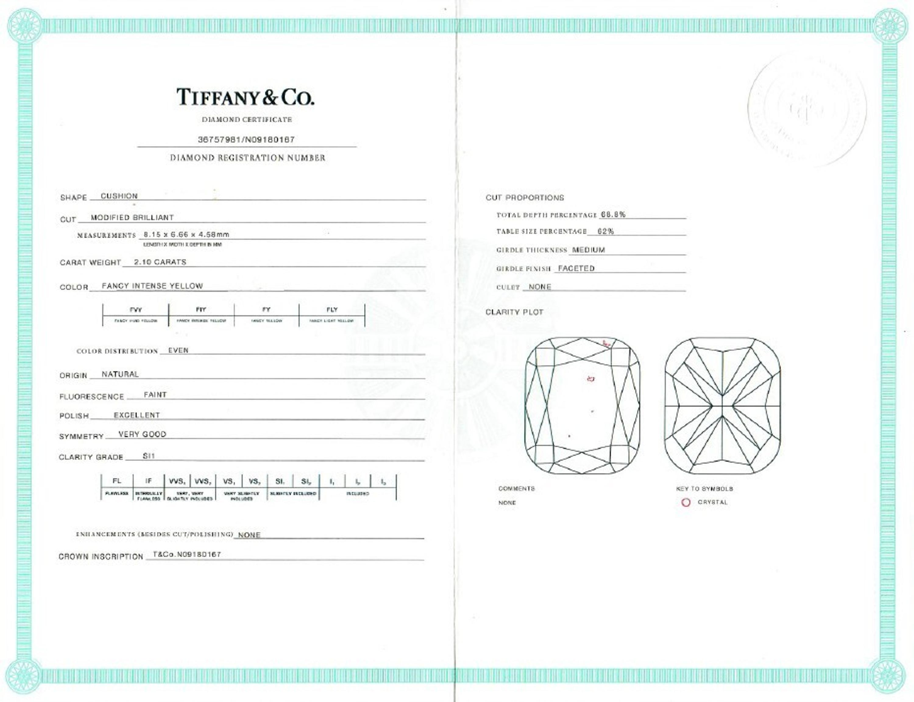 TIFFANY & CO., FANCY INTENSE YELLOW DIAMOND, DIAMOND, AND PLATINUM 'SOLESTE' RING