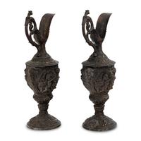 A Pair of Neoclassical Cast Metal Ewers