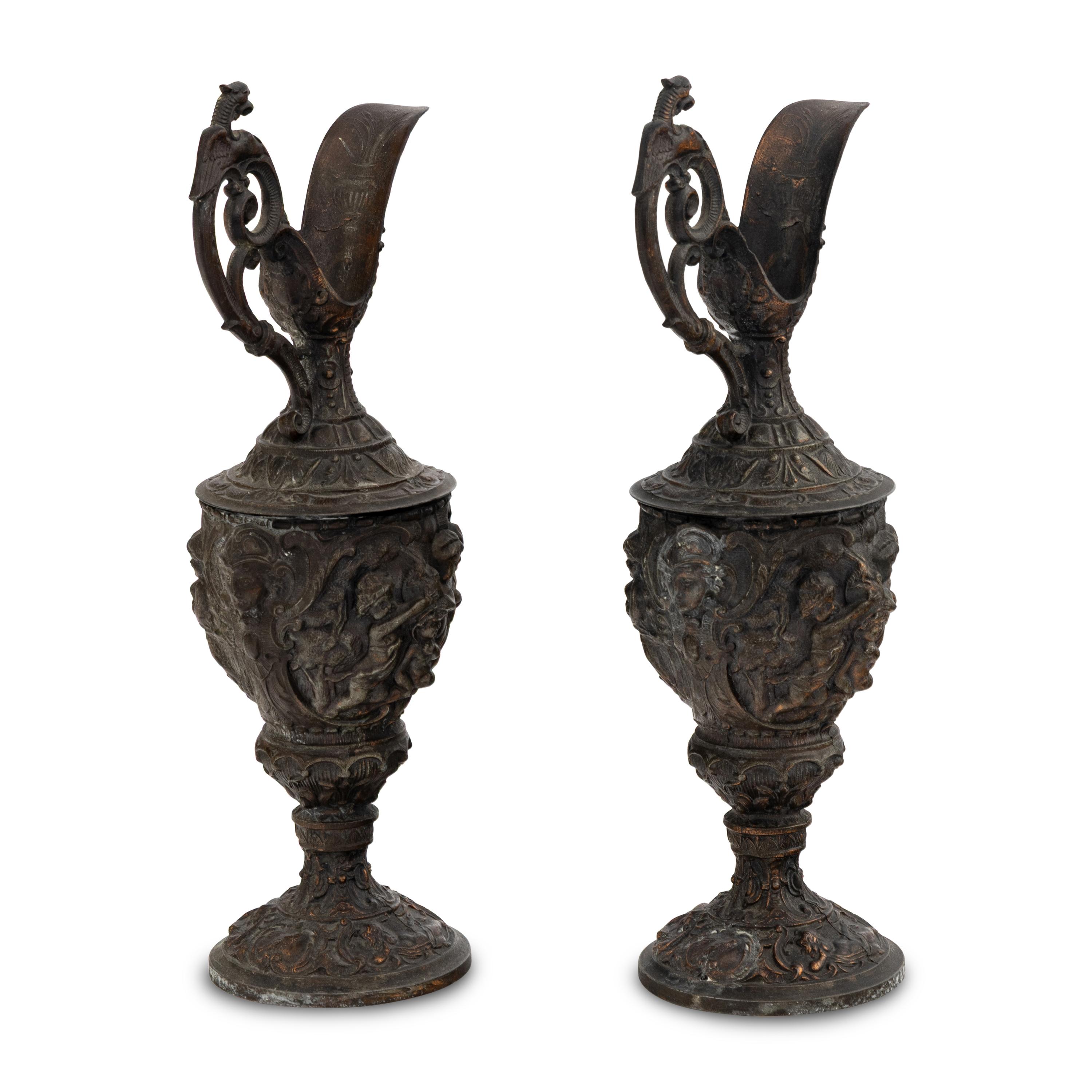 A Pair of Neoclassical Cast Metal Ewers