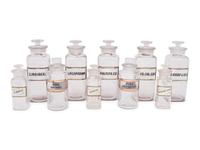 A Collection of Clear Glass Apothecary Jars