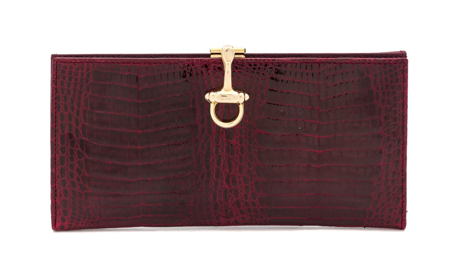 A Gucci Crocodile Wallet, 7" x 3".