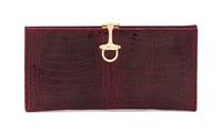 A Gucci Crocodile Wallet, 7" x 3".