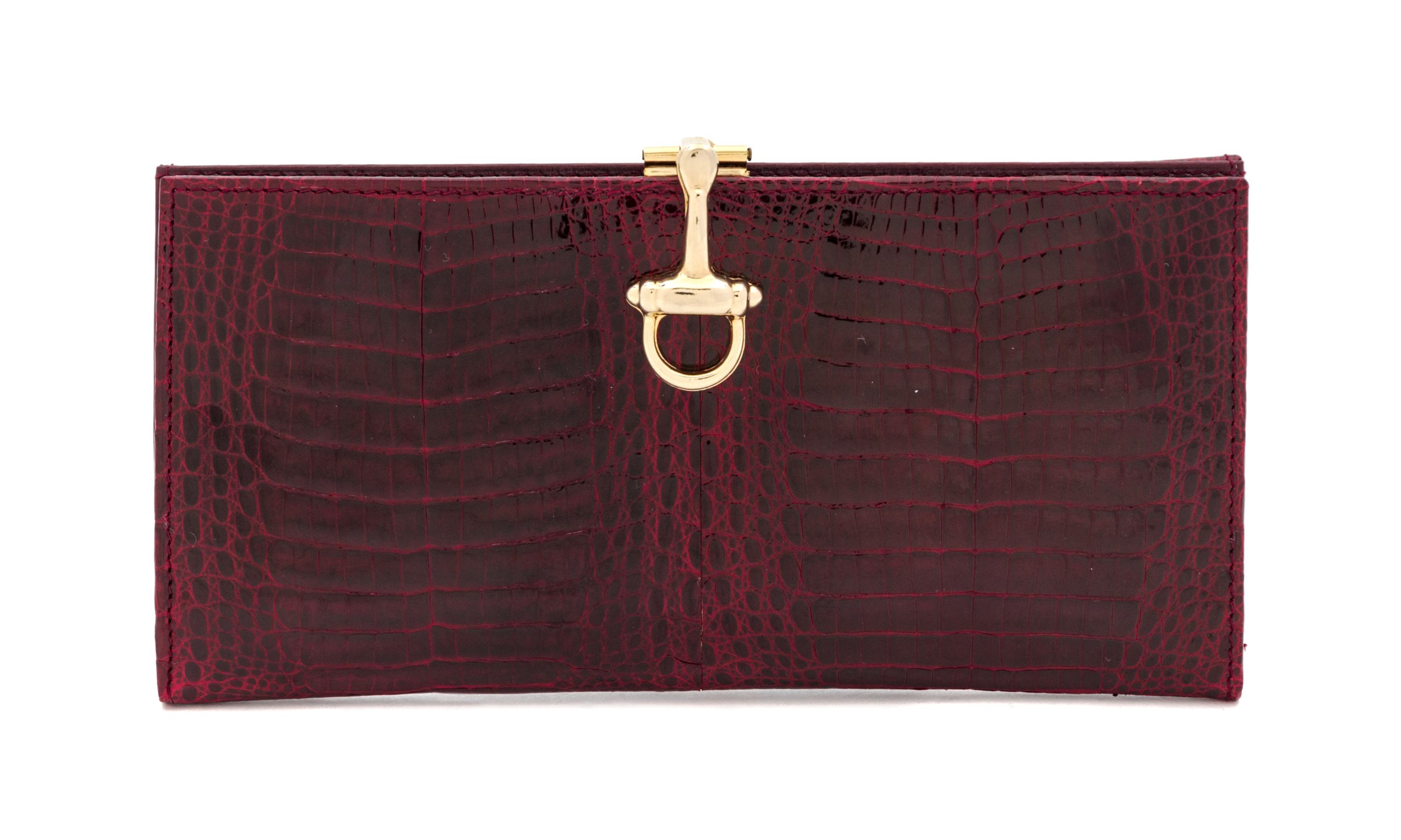 A Gucci Crocodile Wallet, 7" x 3".