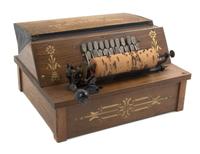 A Gem Roller Organ, AUTOPHONE CO., Height 7 3/4 x width 14 1/4 x depth 11 3/4 inches. — AUTOPHONE CO.,
