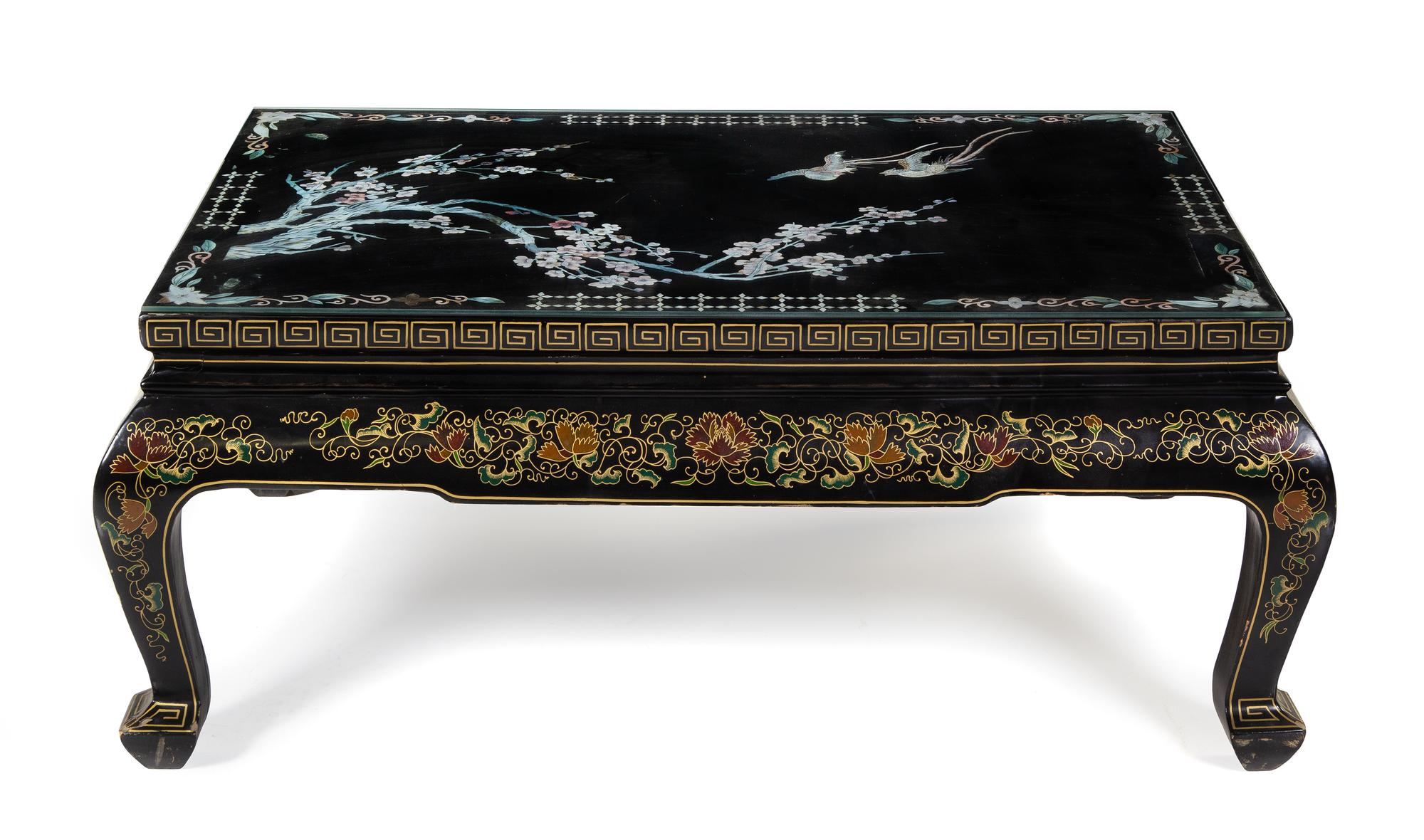 A Chinese Mother-of-Pearl Inlaid Black Lacquered Wood Coffee Table Height 17 3/4 x width 43 x depth 26 inches. — 20TH CENTURY