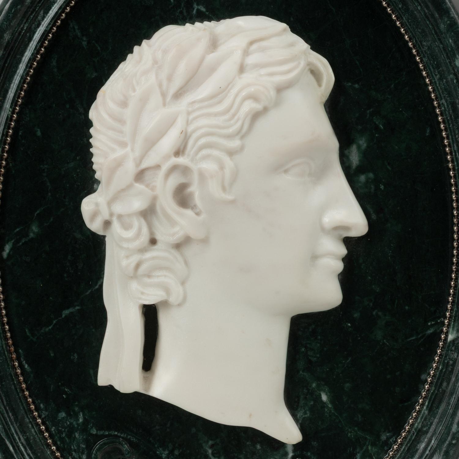 A Set of Four Italian Marble Oval Plaques