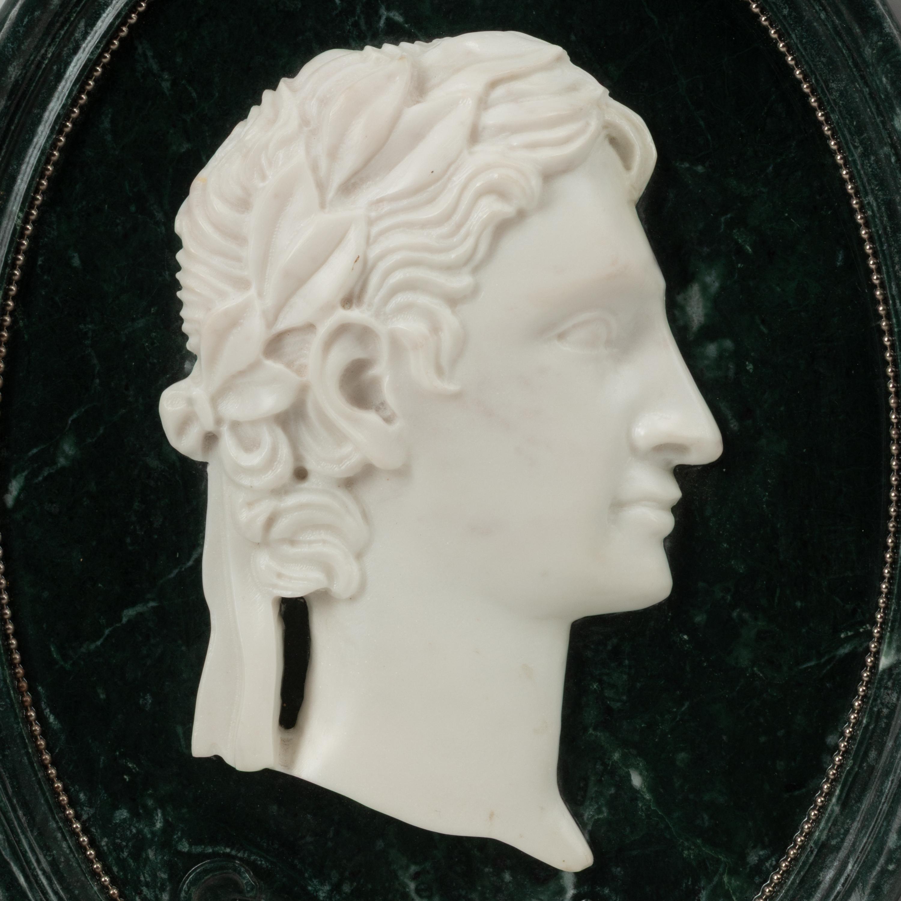 A Set of Four Italian Marble Oval Plaques