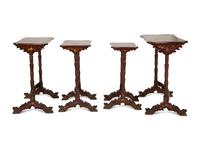 A Set of Four Chinese Lacquered Nesting Tables