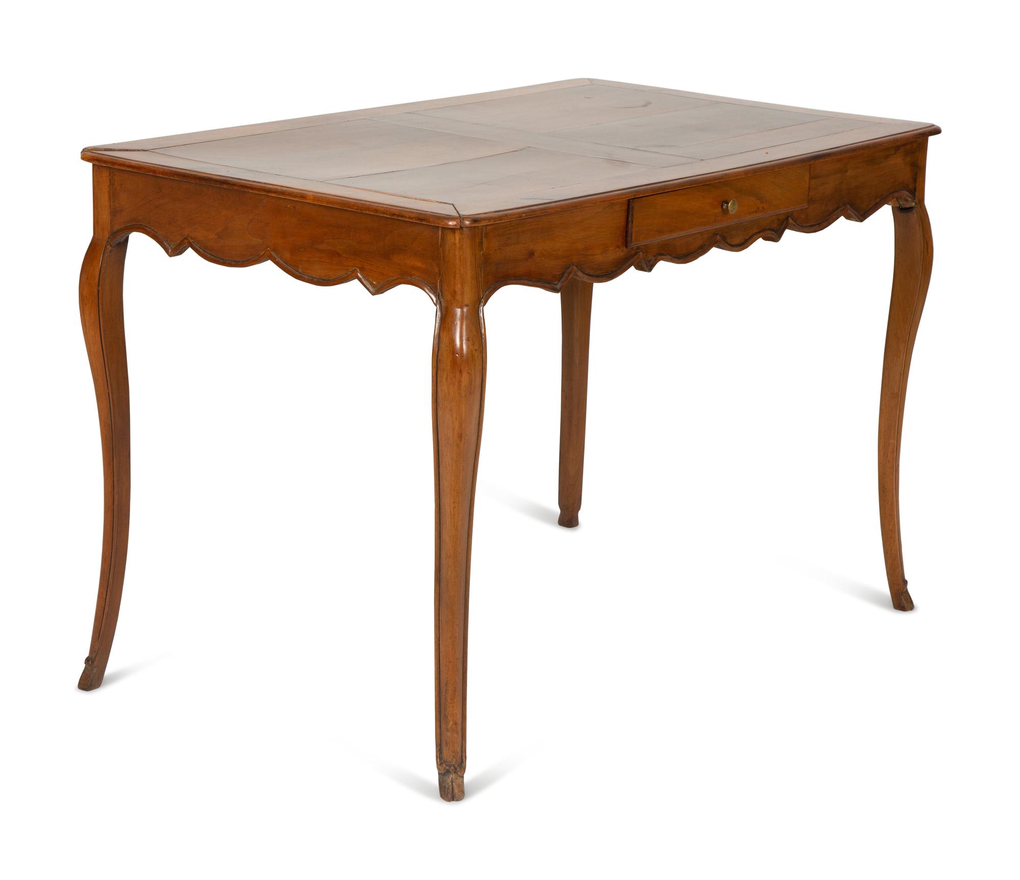 A French Provinical Carved Walnut Writing Table