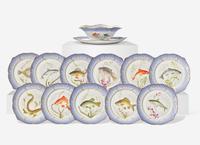 Twelve Royal Copenhagen Parcel Gilt Porcelain Ichthyological Plates and a Sauce Boat