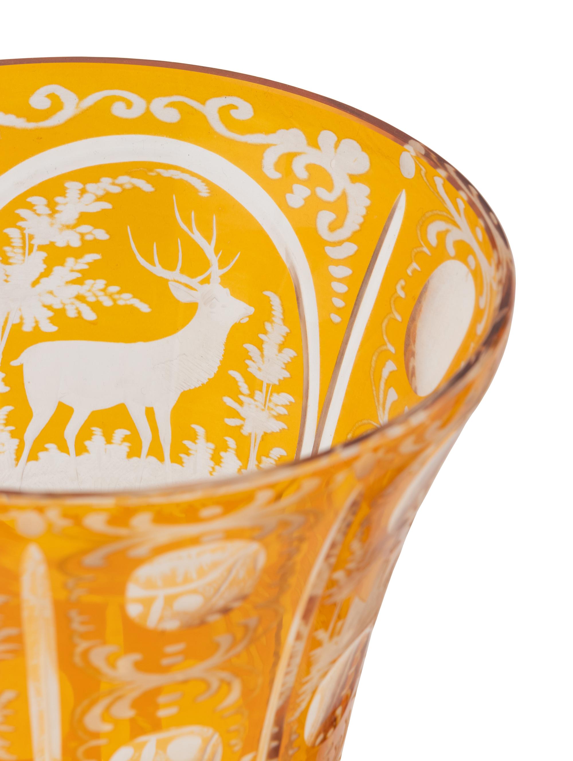 A Bohemian Amber Etched Glass Table Service