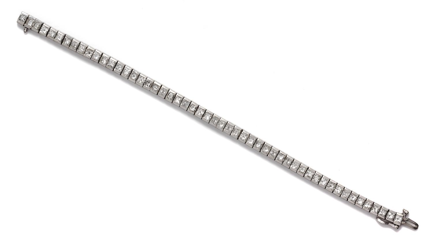 A White Gold and Diamond Line Bracelet, 14.70 dwts.