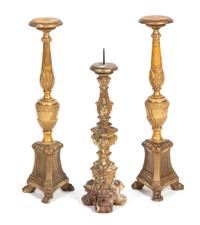 A Group of Three Italian Rococo Style Carved Giltwood Pricket Candlesticks Height of taller 22 1/2 inches. — 19TH CENTURY