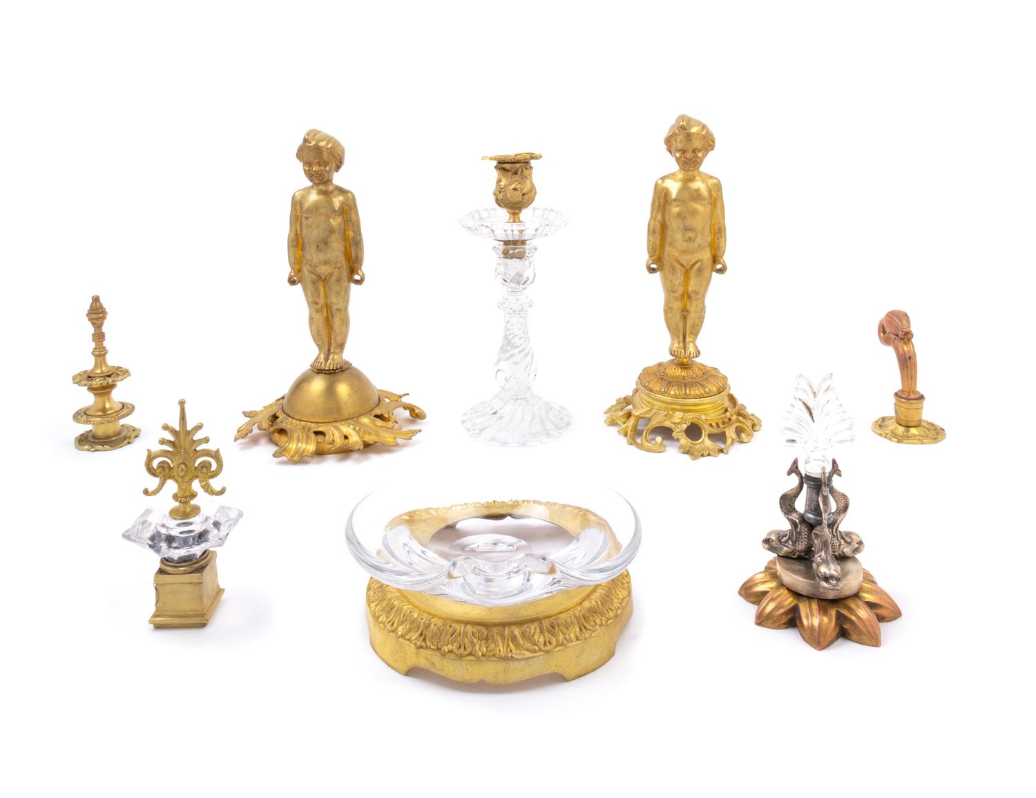 Eight Gilt Bronze and Glass Table Articles